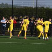 The Harborough Town players celebrate Rhys Hoenes' goal which sent them on their way to a 2-0 win over Hinckley Leicester Road last Saturday. Picture by Andrew Carpenter