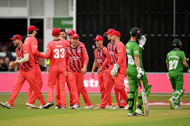 Lancashire celebrate the wicket of Hamish Rutherford. (Photo by Ross Kinnaird/Getty Images)