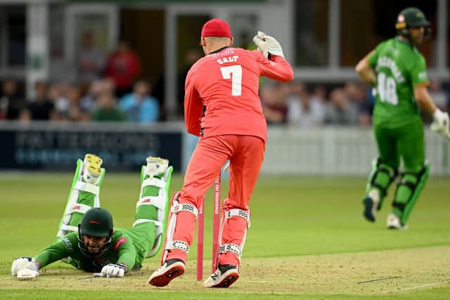 LEICENaveen-ul-Haq makes his ground. (Photo by Ross Kinnaird/Getty Images)