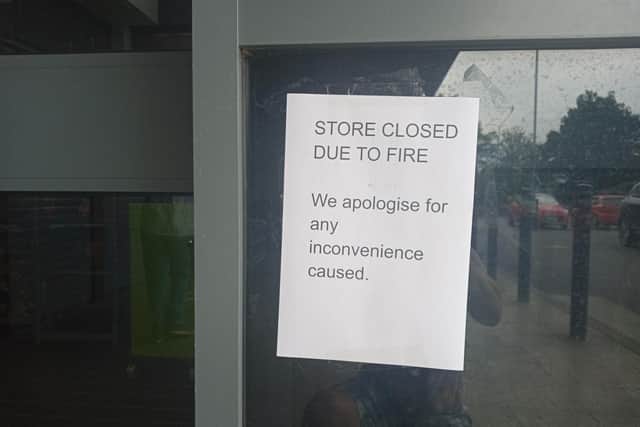 Shoppers were still turning up in the supermarket’s car park at 4pm and trying to go in before spotting signs at the entrances saying the store has been closed “due to fire”.