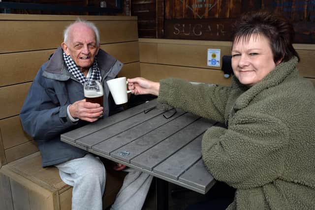 Alan Gibson 85 enjoys a pint with daughter Tina 49 at Wetherspoons.
PICTURE: ANDREW CARPENTER