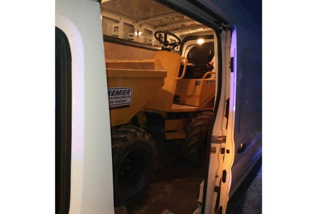 The stolen dumper truck was found by police jammed into the back of a van they stopped in Nottinghamshire.