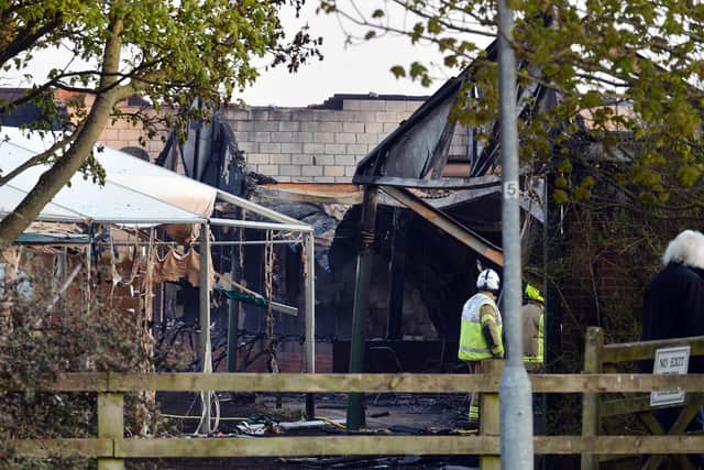 Firefighters at the scene after a major fire at Lutterworth Golf Club. Photo by Andrew Carpenter.