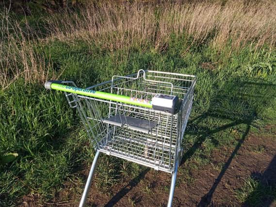 Thieves have randomly dumped a Co-operative shopping trolley in a farmer’s field in Market Harborough.