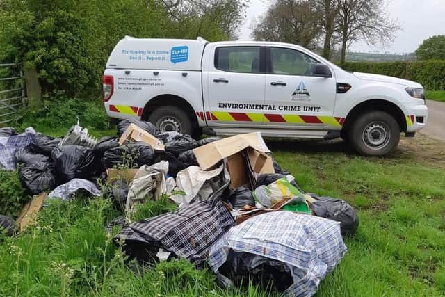 Cannabis waste has been dumped along with a pile of other rubbish at a scenic countryside spot in a Harborough village.