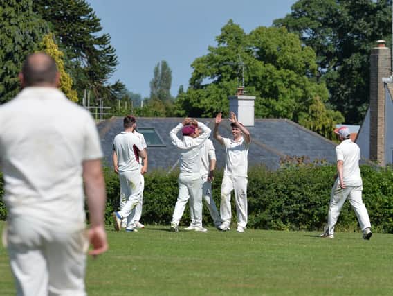 Market Harborough’s Nick Hall celebrates taking a catch to dismiss Dan Scudamore during their 85-run defeat to Haughton & Thurnby in Division Two. Picture by Andrew Carpenter