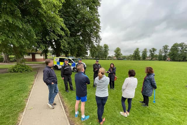 Police and concerned residents visit some of the hot spots at Little Bowden recreation ground.
PICTURE: ANDREW CARPENTER