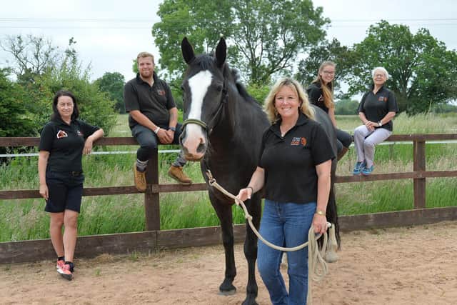 Dina Shale founder of The Way of the Horse with Luna and team members.
PICTURE: ANDREW CARPENTER