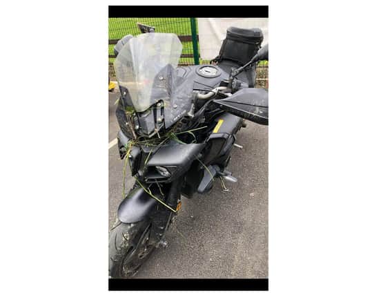 A motorcyclist is being treated at hospital after he crashed into a field near a Harborough village this afternoon (Tuesday).