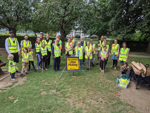 More than two dozen people of all ages have banded together to help clean up one of Market Harborough’s most prominent and popular parks.