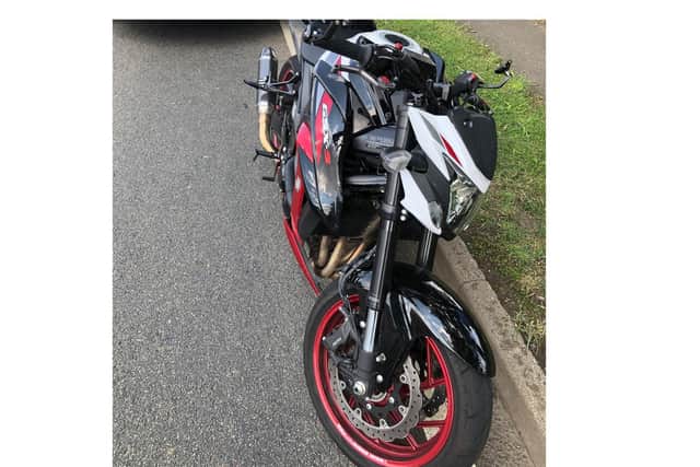 A motorcyclist carrying a child pillion passenger was stopped on a busy road near Market Harborough by police today (Wednesday) for speeding and riding aggressively.