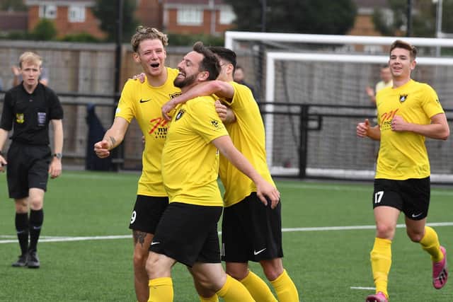 Daniel Forbes celebrates Bees' second goal with Scott Mooney