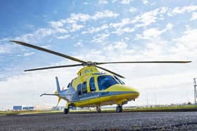 A woman cyclist is fighting for her life today after she was hit by a car in a Harborough district village and airlifted to hospital.