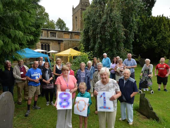 Church-goers and villagers gathered to celebrate the 801st birthday of St Peter and St Paul Church at Great Bowden.