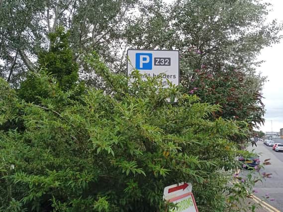 The permit holder sign is positioned at the entrance to the estate - over 500 metres away from the parking spaces outside the Furniture Loft.