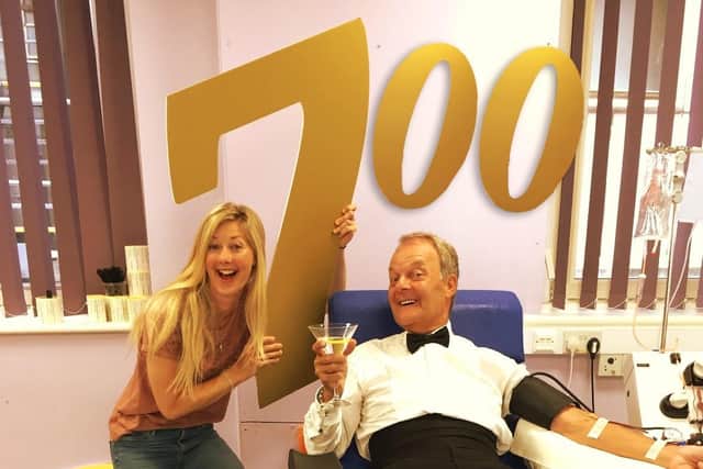 Alan White got kitted out as 007 when he donated his 700th blood platelet