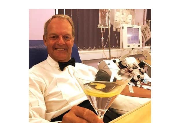 Alan White got kitted out as 007 when he donated his 700th blood platelet