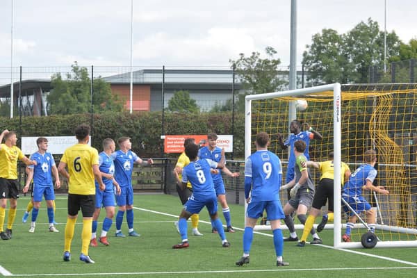 The ball is in the net for Harborough Town's opening goal in the 3-1 win over Potton United last Saturday. Picture by Andrew Carpenter