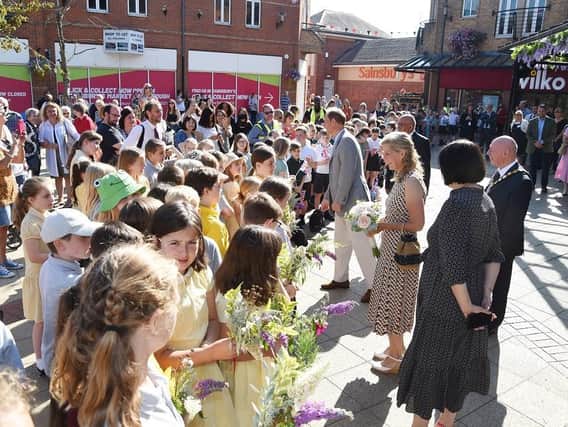 Their Royal Highnesses greet the crowds in Market Harborough