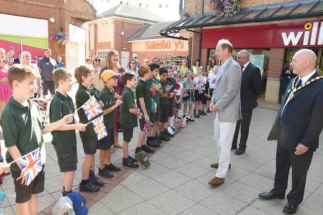 HRH Earl of Wessex greets Meadowdale Primary School children with Lord-Lieutenant Mike Kapur and The Chairman of Harborough District Council Councillor Stephen Bilbie