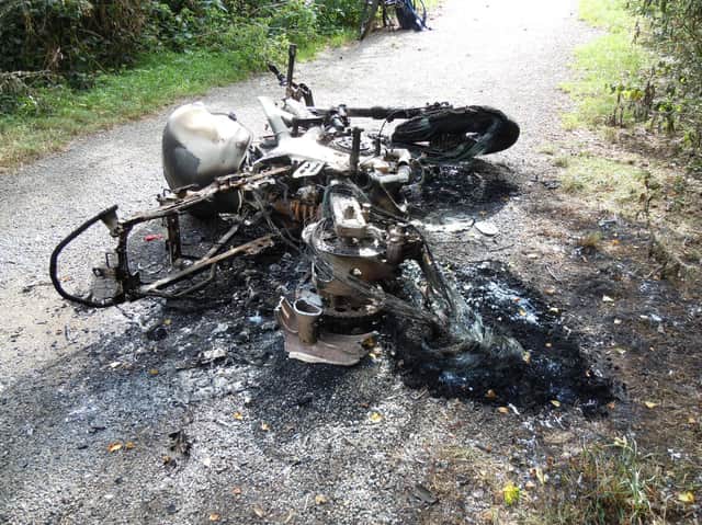 A motorbike has been set on fire and dumped near Market Harborough.