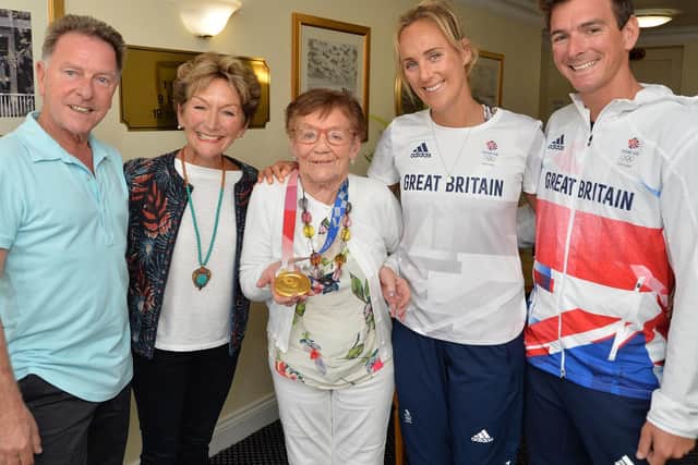 Olympic Gold Medal-winning sailor Dylan Fletcher returned home to Market Harborough for the first time since his heroics in Tokyo in August and visited his grandmother Hannah Scott at Pegasus Court. His new bride Charlotte Dobson, also a brilliant Olympic sailor, joined him for the visit.Dylan's mum and dad Jane and Graham (pictured), of Desborough, also came along.