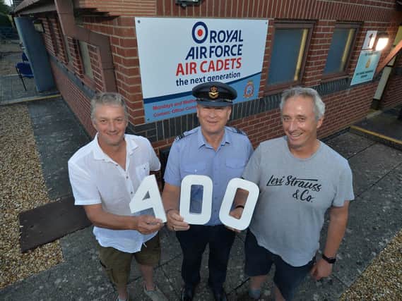 Michael and Steve Crook of Harborough at War during the presentation of £400 to Flt/Lt Mark Cheetham of 1084 ATC Squadron in Market Harborough.
PICTURE: ANDREW CARPENTER