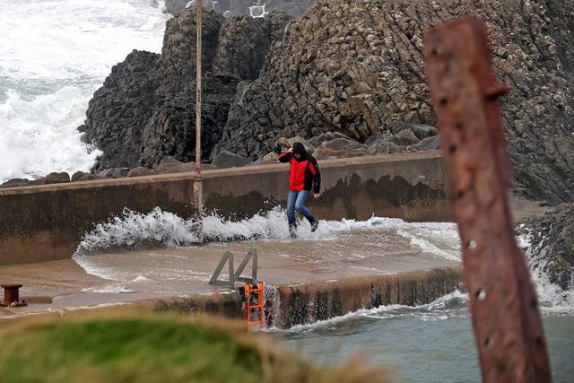 Members of the public got caught out by the waves at Ballintoy Harbour Co Antrim.