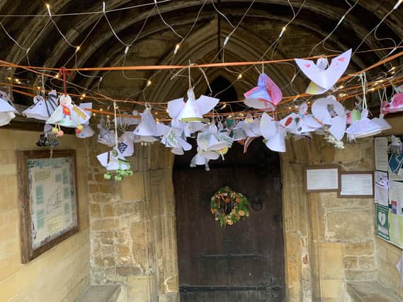 The angels hung in the church doorway