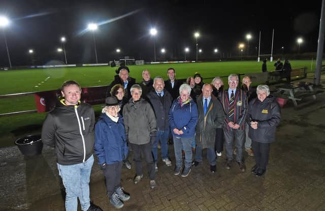 Charity and council representatives celebrated the switch on with Market Harborough Rugby Club member Mike Fletcher.