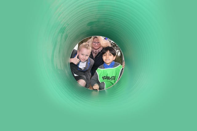Peepo! Amanda Biggs and pupils check out the play tunnel.
PICTURE: ANDREW CARPENTER