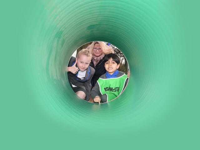 Peepo! Amanda Biggs and pupils check out the play tunnel.
PICTURE: ANDREW CARPENTER