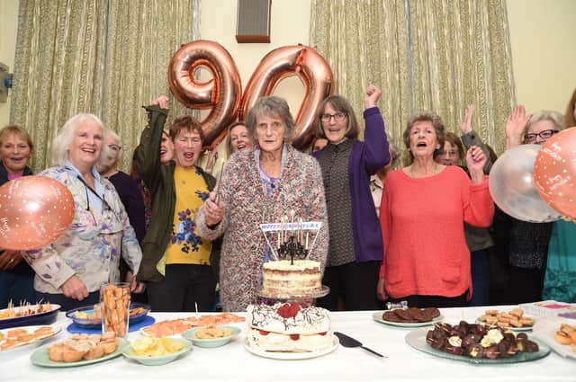 Julia Blake president of Clipston WI with Grace Burham 90 and daughter Angela Fellowes during the cake cutting. PICTURE: ANDREW CARPENTER