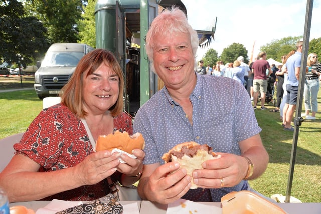 Tasty...Mary and Roger Lewin tuck into their burgers during the Food and Drink Festival at Welland Park during the Bank Hoilday weekend.