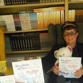 Sheila enjoys visiting libraries to read her books to children.