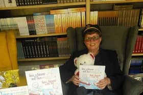 Sheila enjoys visiting libraries to read her books to children.