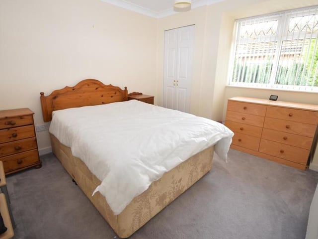 Here is the second double bedroom, which is also a good size. There is a built-in cupboard, plus a radiator, coving to the ceiling and a uPVC window to the side.