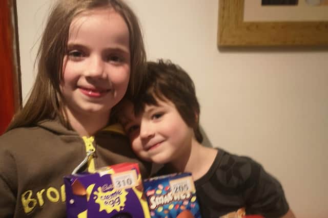 Sophie and Matthew Deane with some of the chocolate eggs.