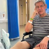 Nic Olsen in hospital after his second leg amputation. (Photo: SWNS).