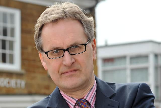 Mark Robinson has announced he will step down as Market Harborough Building Society chief executive after nearly 15 years in the post.