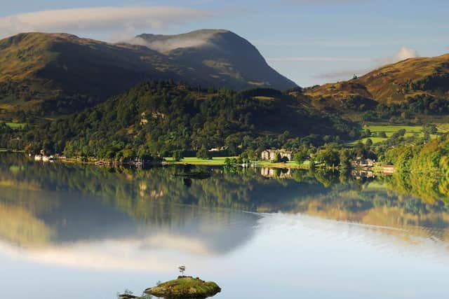 Lake Ullswater has crystal clear shingle waters flanked by every shade of green