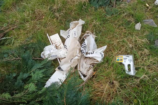 Fly-tippers have dumped a huge pile of building rubbish and takeaway waste in countryside on the outskirts of Market Harborough in the last 24 hours.