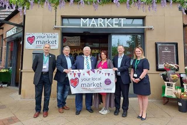 David Wright of Harborough council, Cllr Phil King, Cllr Mick Barker, Sophie Smith, MP Neil O’Brien and Gail Bates, market manager