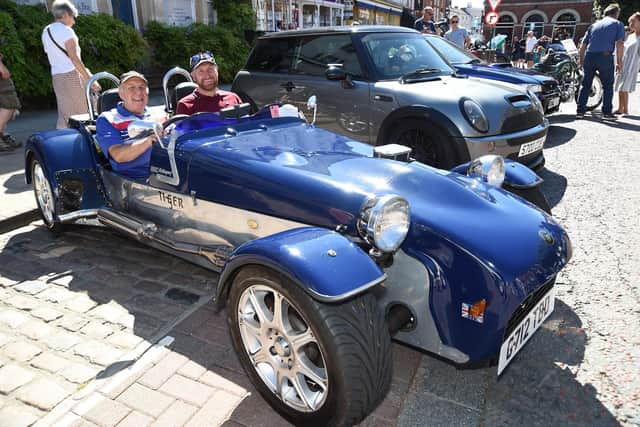 Peter Coe in his Tiger with his son Damian during the classic car show. PICTURE: ANDREW CARPENTER