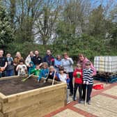 Volunteers and staff at the wellbeing garden