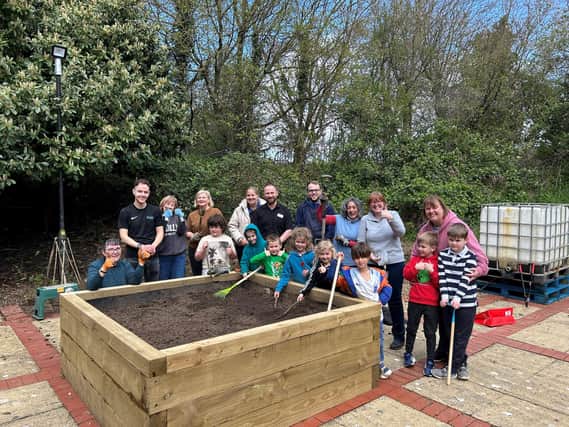 Volunteers and staff at the wellbeing garden