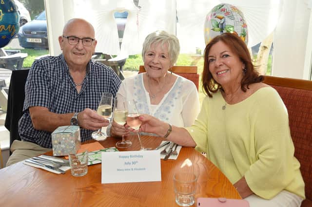 John Pugh, Mary Holzmann and Liz Tailby celebrating their birthdays on the same day at the Langton Inn.