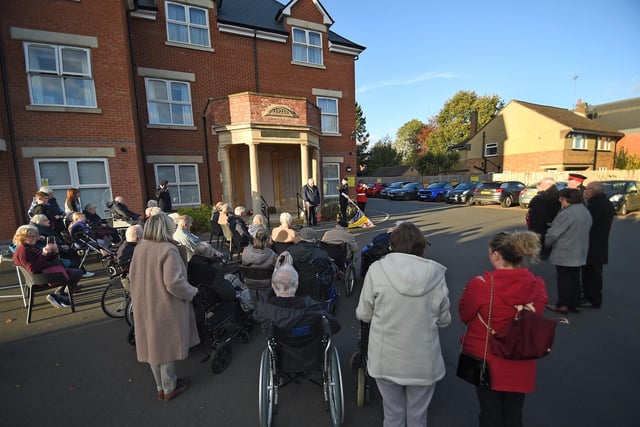 The two minute silence at the Rosewood Nursing home portico.
