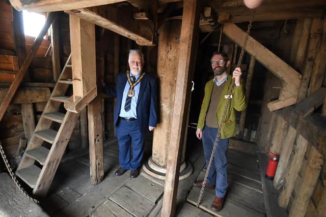 Leicestershire County Council chairman Dr Kevin Feltham with SPAB director Matthew Slocambe  inside the mill.