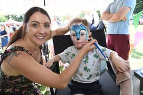 Face painter Chloe Guidera and Rory Carter 5.